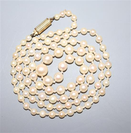 A single strand cultured pearl necklace with 585 yellow metal clasp, 58cm.